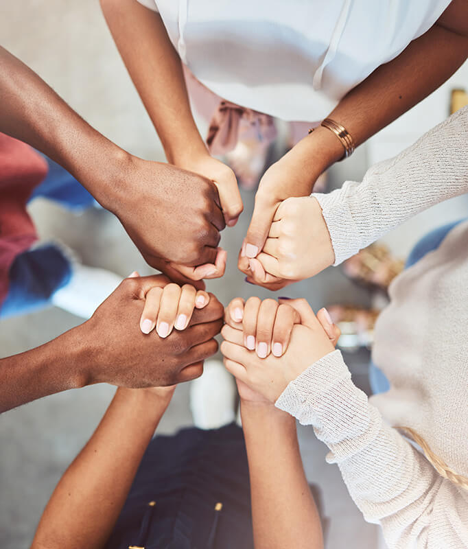 People support each other at a mental health treatment center.